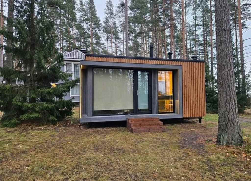 Миниатюра: Фасад бани среди сосен